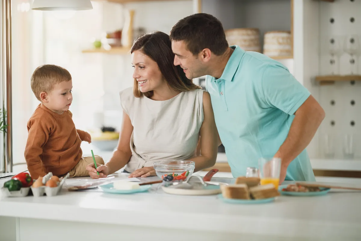 Family gathered around a kitchen table