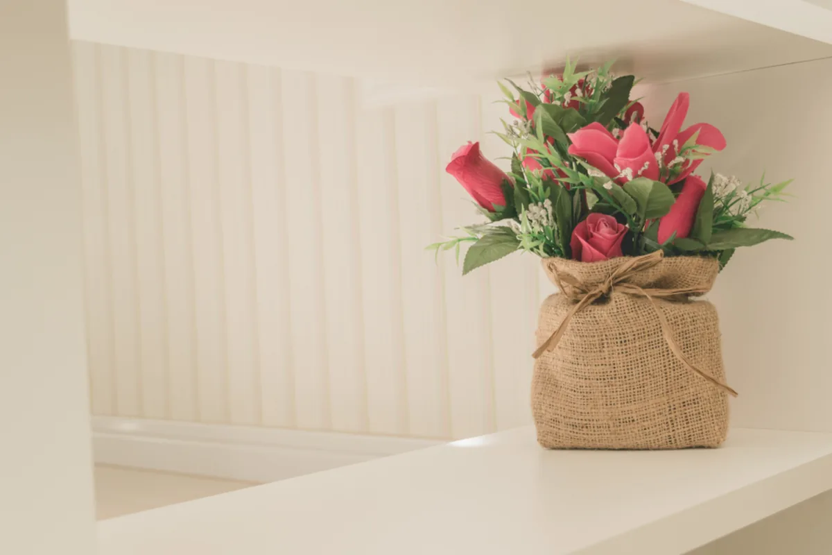 Pink flowers in a planter brightening a new room