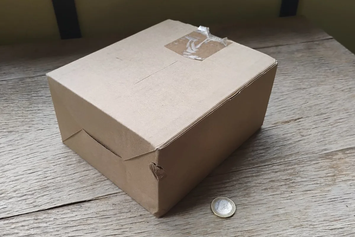 Packed cardboard moving box on a table